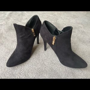 Black suede bootie heel